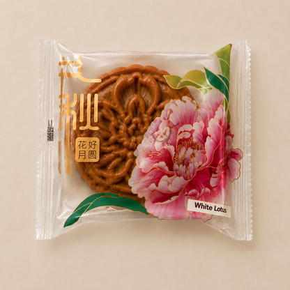 Homemade Malaysian white lotus mooncake in Mid-Autumn packaging