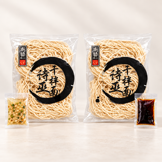 Two individual The Kitchen Food Sibu Kampua packs: Original and Dark Soy Sauce